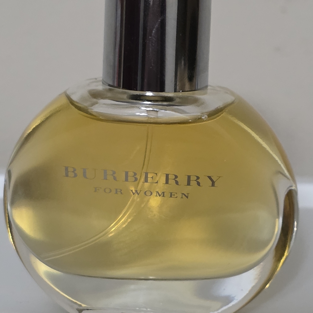 Burberry Women's Fragrance with Silver Cap and Golden Hue